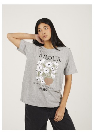 Camiseta de mujer con manga corta y cuello caja. Con estampado frontal floral